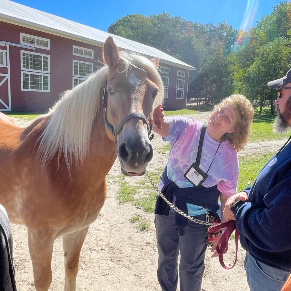 Jill shares a moment with Jessica the horse