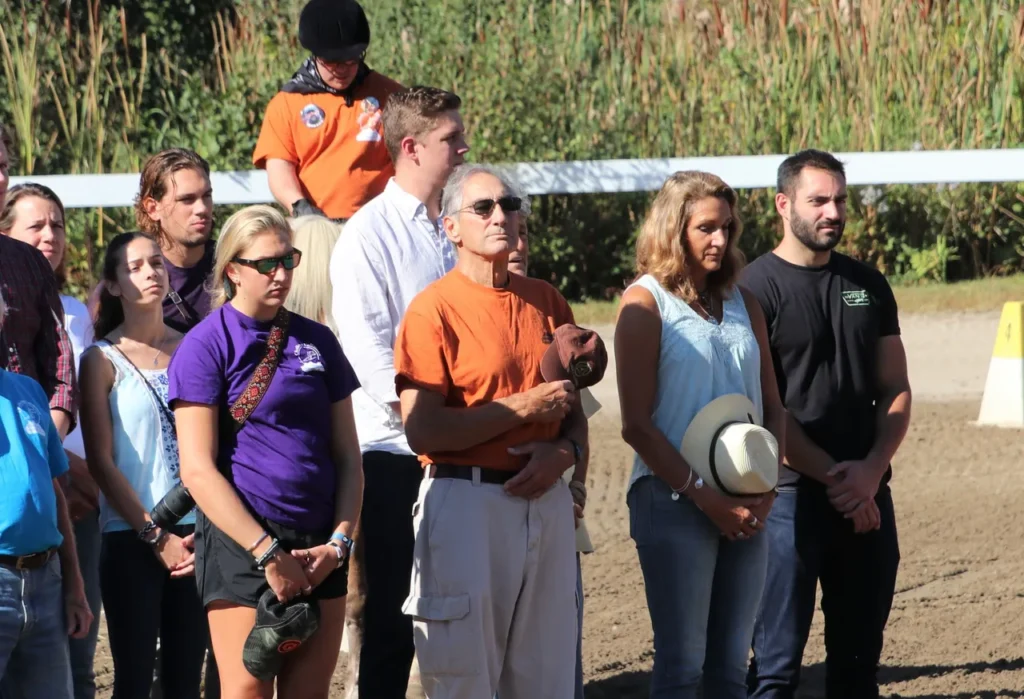 Nick DeNitto (center) and family during the Barbara DeNitto Horse Show's opening ceremonies